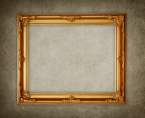 golden picture frame on wall