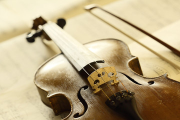 antique violin with fiddlestick