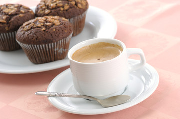 chocolate chip muffin and cup of coffee