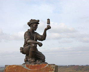 A Statue of a British Coal Miner.