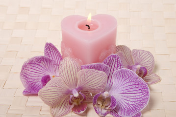 Candle and orchid