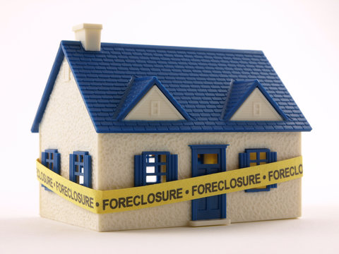 House with Foreclosure tape