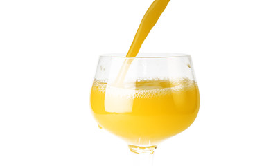 fresh orange juice in glass on a white background