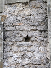 Vieux mur de pierre abimé