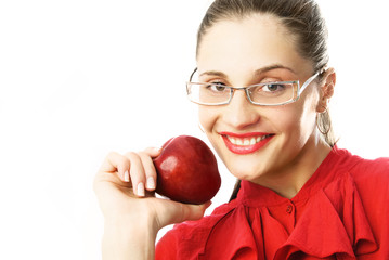 beautiful businesswoman eating an apple