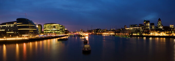 London skyline at twilight.including City Hall, Gherkin,