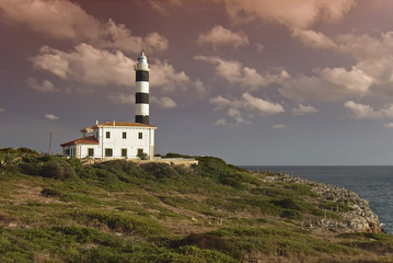 Fototapeta na wymiar Mediterranean Lighthouse at sunset