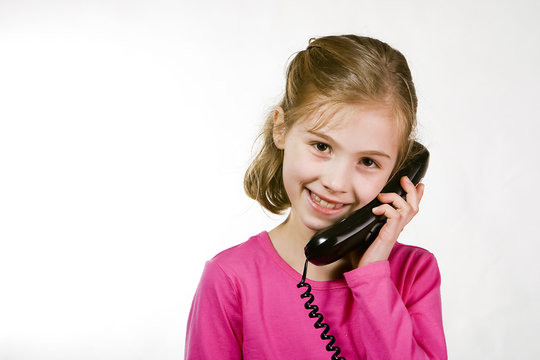 Cute Kid Talking On The Phone