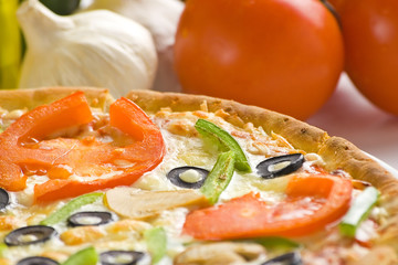 homemade pizza with fresh tomato olive mushroom cheese