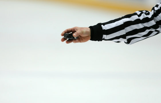 Refree with Puck