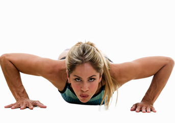 Fototapeta na wymiar Woman doing push-ups