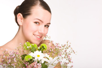 Portrait of Fresh and Beautiful girl with flowers