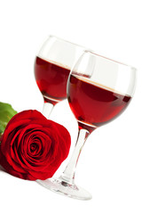 wine glasses and red rose isolated