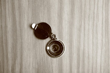 Peephole on a wooden door