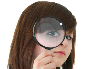 Young student with magnifier