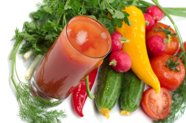 Fresh vegetables and glass of tomato juice