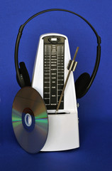 Metronome in action with headphones and CD/DVD