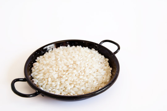 Paella pan and rice