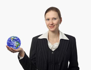 beautiful businesswoman with earth on her hand