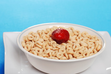 closeup of cereal with a strawberry