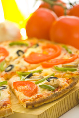 homemade pizza with fresh tomato olive mushroom cheese