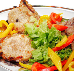 BBQ meat with vegetables and greens