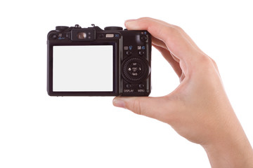 Fototapeta premium Hand photographic with a digital camera isolated on white