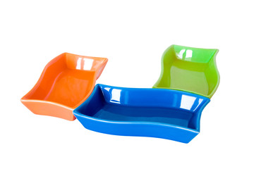 three colored sauce-boats