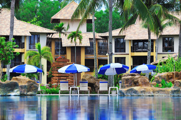 deck chairs along the pool side