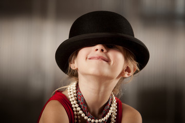 Fototapeta na wymiar Dziewczyna z jej twarzy, w jej kapelusz