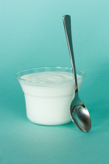 macro image of yogurt in a glass jar