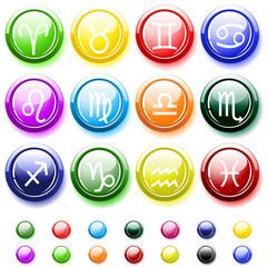 Glossy buttons with zodiac signs isolated on white