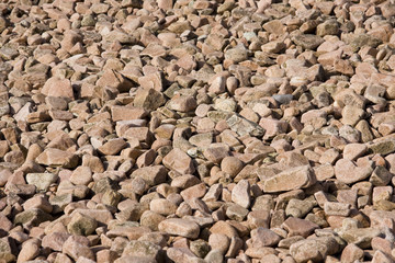 pink rock on a beach in brittany