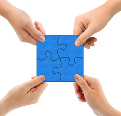 Hands and puzzle