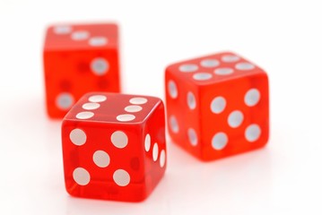 Three red dices isolated on white