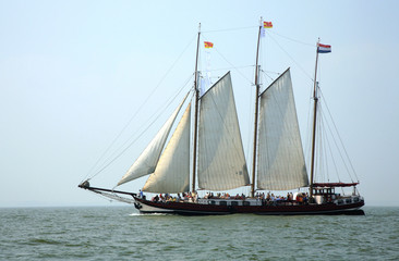 Fototapeta na wymiar Sailing ship under full sail.