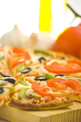 homemade pizza with fresh tomato olive mushroom cheese