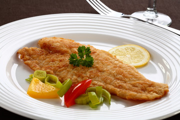 Fried fish fillet with vegetables