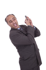 Naklejka premium Business man having discussion on cellphone