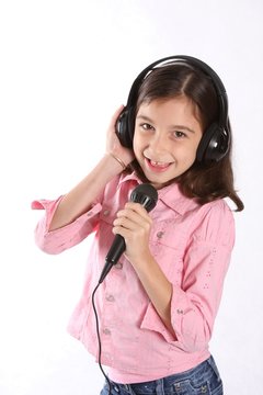 Young Girl / Child Singing In Microphone
