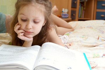child reading a book