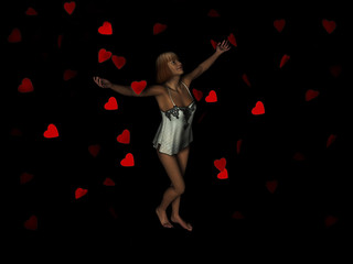 Woman surrounded by falling hearts.