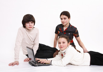 Children and a computer