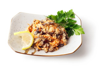 Mix from soused mushrooms and carrot with parsley and lemon