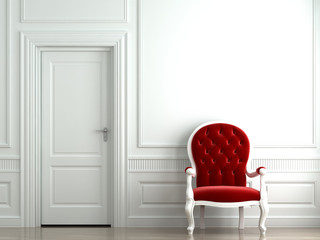 red velvet armchair on white wall
