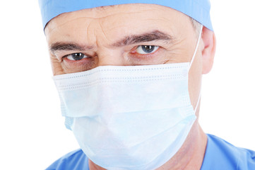 look mature male surgeon in medical mask