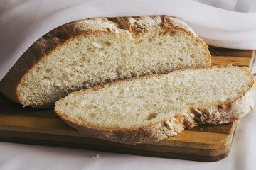 The cut bread on a board