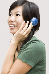 Naklejka premium Enjoy the music - Woman wearing headphones, listening to music