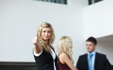 Businessteam infront of a building