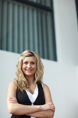 Business woman in front of a building